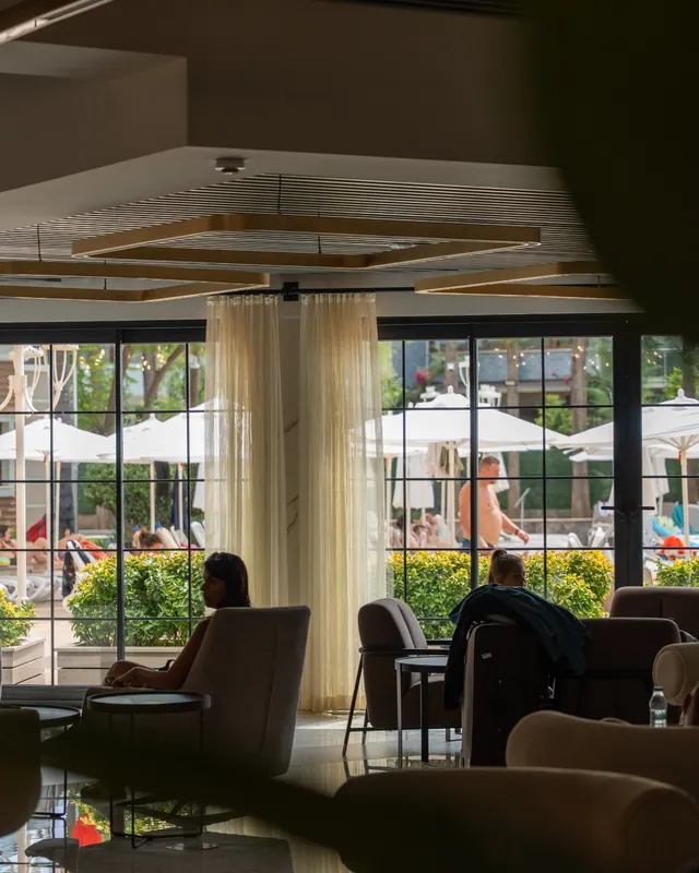 Mert Tekstil Alanya — Soft light across wide windows